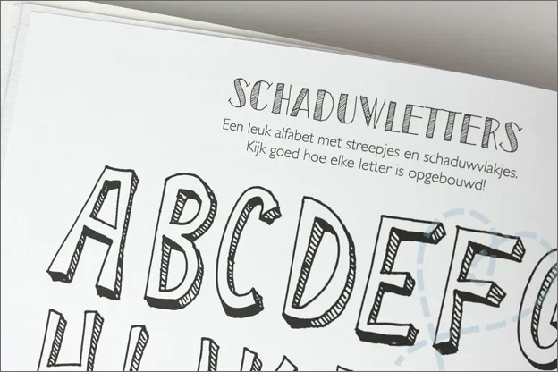 Action handletteren schaduwletters