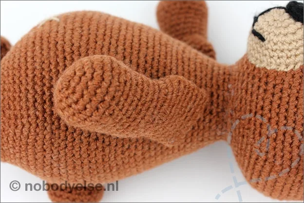 Haken beer arm vastmaken stopnaald