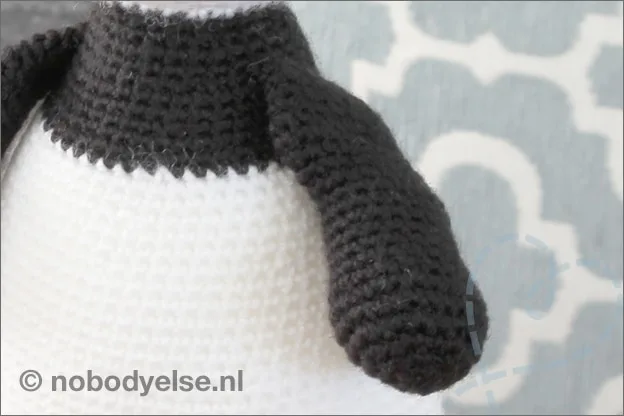 haken pandabeer knuffel arm
