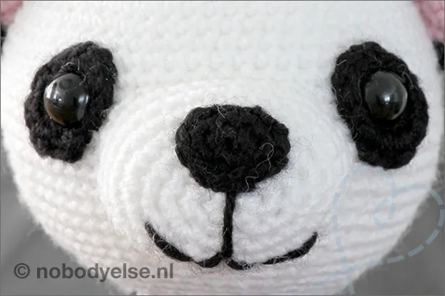 Haken panda ogen snuit