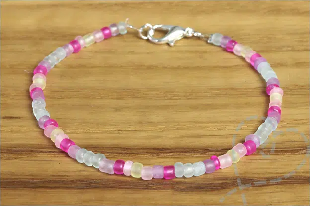 Action Kralendoos XL Armbandjes maken voorbeelden uitleg